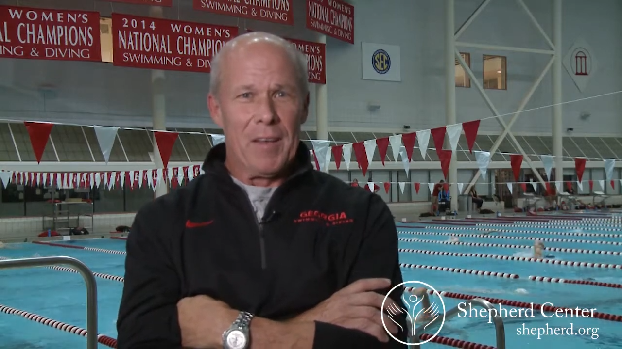 Headshot of Jack Bauerle in front of pool.